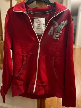 American Eagle Outfitters Red Full-Zip Hoodie with Grey AE Eagle Patch